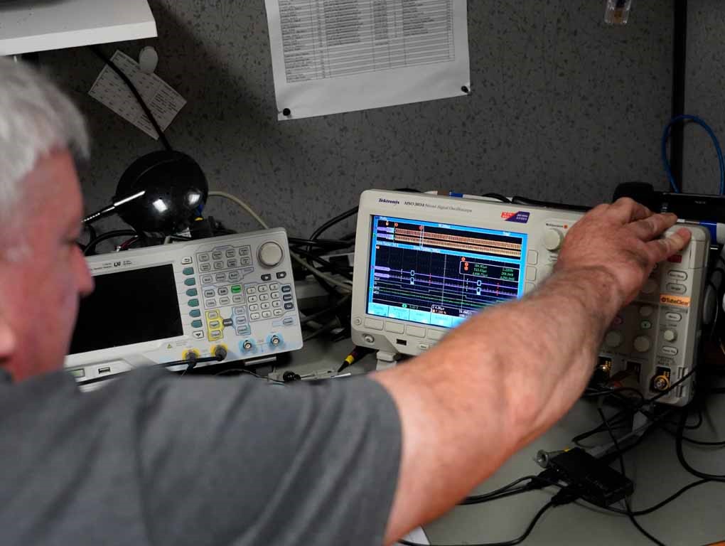 Engineer working with Oscilloscope